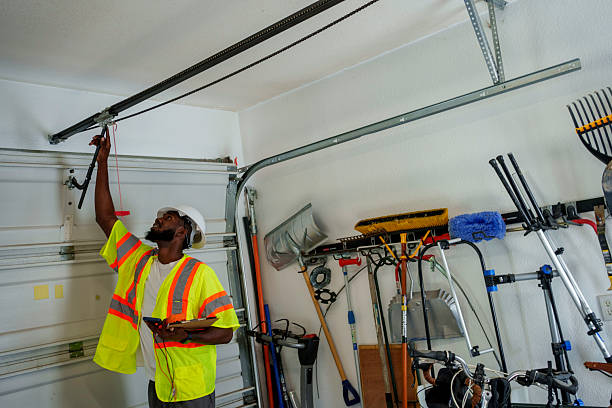 Professional Garage Door Panel Replacement technician working in St. Paul, MN